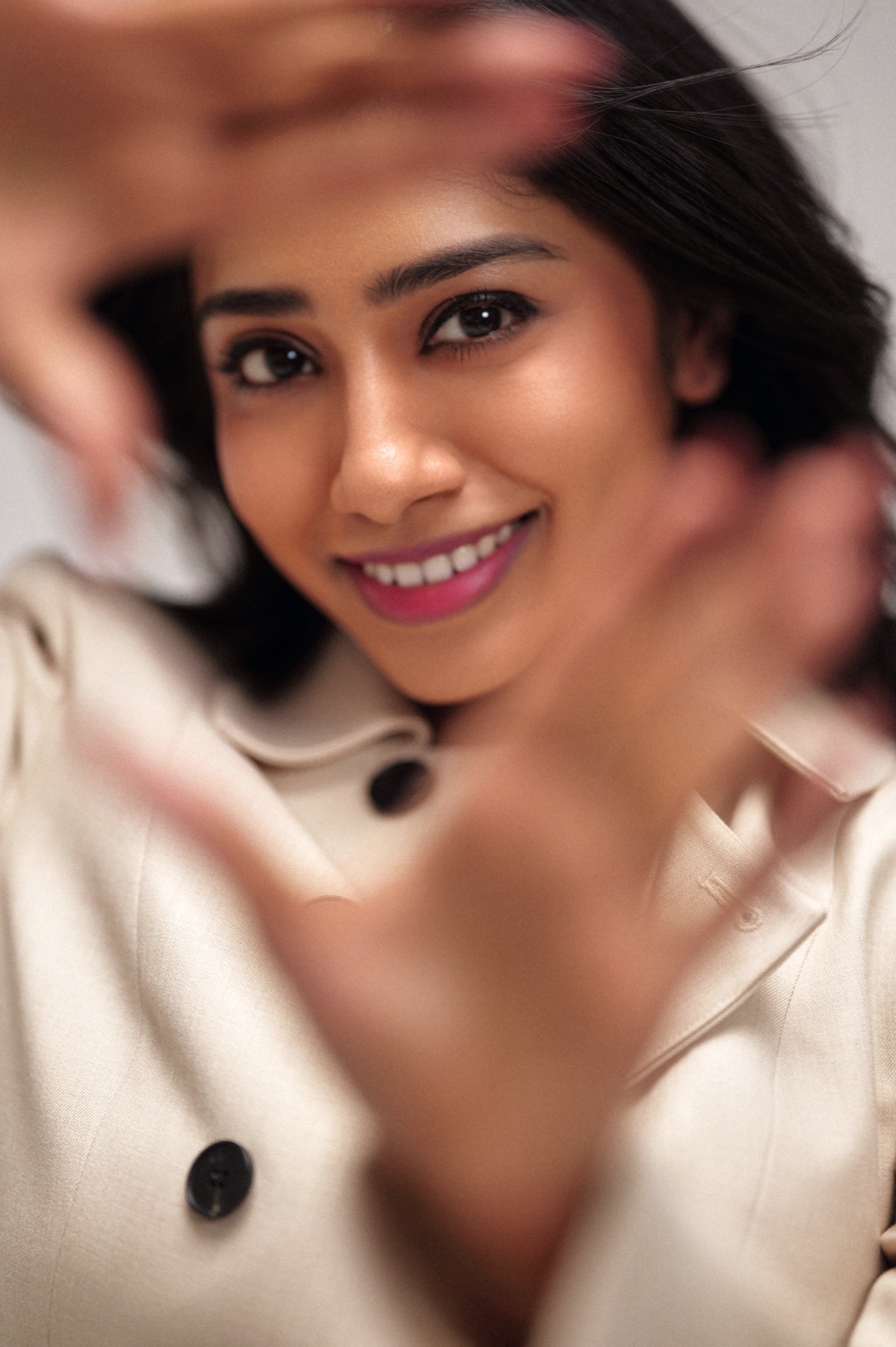 Ash Bala in a cream blazer